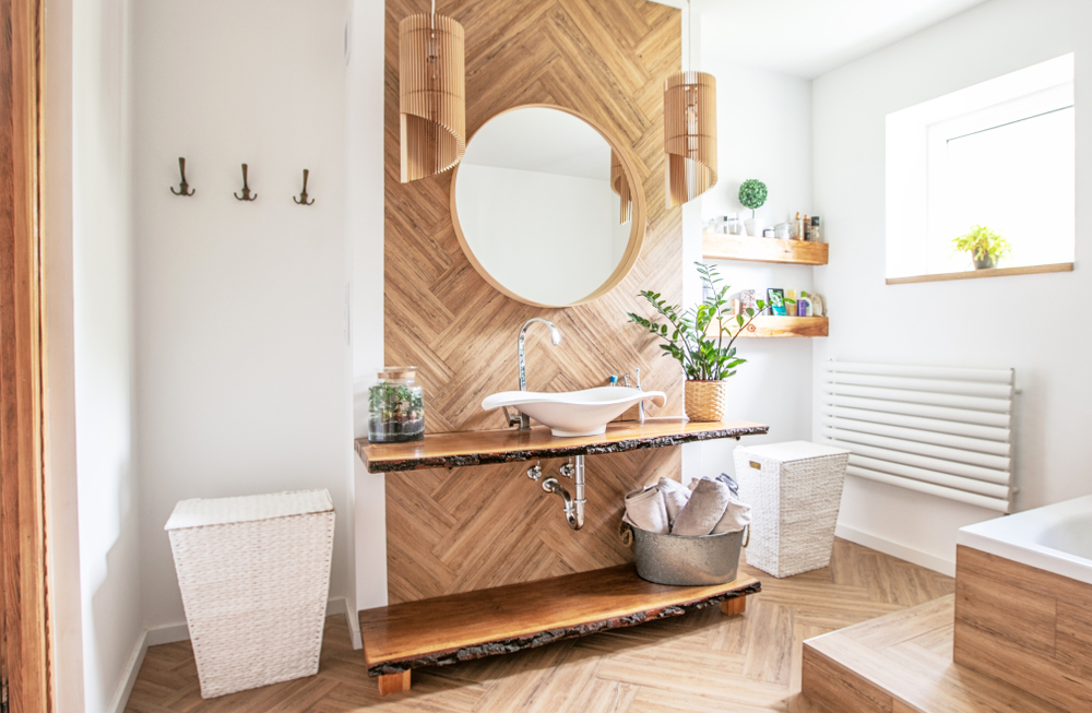 White sink on custom wood vanity
